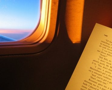 read book on airplane